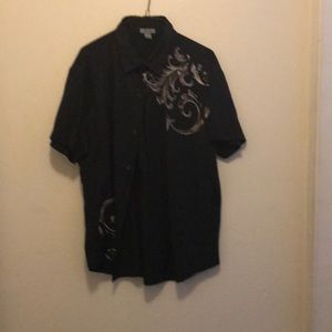 A men black and cream shirt